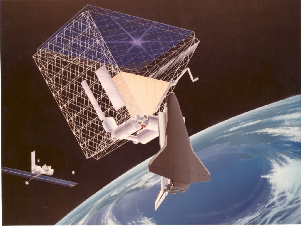 This conceptual space station came out of NASA's Johnson Space Centre in 1984. Called the "roof" concept, it had an array of solar cells on the upper portion of a triangular structure. Inside the structure would be five experiment and living modules for living as well as plenty of space for external module.