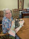 Violet is a member of <a href="http://www.bunniesinbaskets.org/">Bunnies In Baskets</a>, a therapy group that brings bunnies to retirement homes to "promote improvement in human physical, social, emotional or cognitive function."