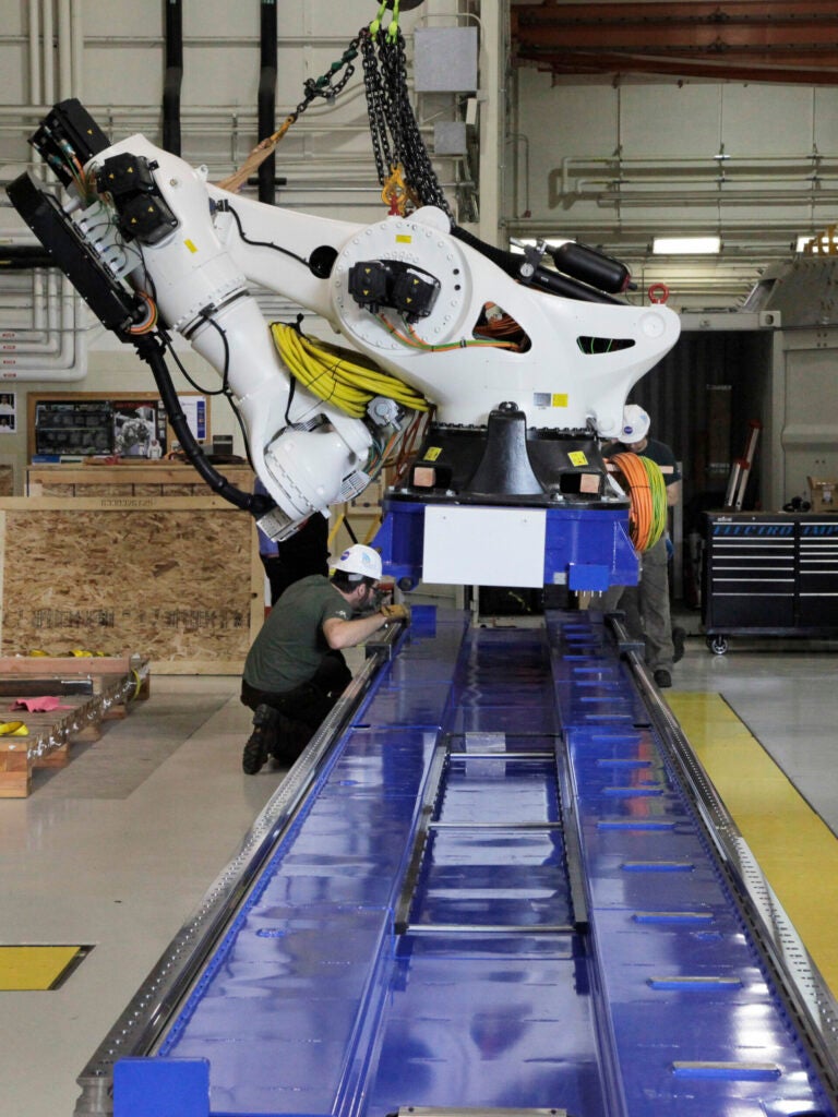 NASA installed this <a href="http://mobile.nasa.gov/larc/nasa-installs-giant-composite-material-research-robot">multi-million dollar</a> composite materials research robot, known as ISAAC, in their Langley aerospace facility this week. The giant machine can build rocket and airplane parts out of epoxy and fibers.