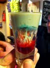 This grotesque shot includes a particular method of layering peach schnapps, Bailey's, blue curacao, and grenadine syrup that results in, according to its creators, an "alien brain hemorrhage." Check out a video of its construction <a href="http://latinrapper.com/blogs/?p=1893">here</a>.