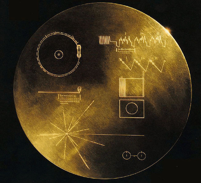 While the Pioneer Plaques were devised during a compressed timeline of three weeks and the Arecibo Message was sent according to the timetable of a cocktail party, the Voyager Golden Records were meant to be a brief compendium of the human experience on Earth and so were given the time and NASA committee resources to make them exceptional. The golden records contain 115 video images, greetings spoken in 55 languages, 90 minutes of music from around the world, as well as a selection of natural sounds like birdsongs, surf, and thunder. Again, hydrogen is the key to unlocking the messages; the same lowest states diagram which appeared on the Pioneer Plaques is here describing the map locating the sun in the Milky Way. It informs the discoverer how to play the record, at what speed, and what to expect when looking for the video images. It's even electroplated with a sample of Uranium so that it might be half-life dated far in the future. Since the <em>Voyager</em> probes are moving much more slowly than radio waves, it will take them nearly twice as long as the Arecibo Message to reach their target stars. Even then, after 40,000 years, they'll only come to within a light-year and a half away. That's equivalent to about 130 times the distance Pluto is from our sun. It's an understatement to say that any of these beacons we've sent have a very long shot of reaching an intelligent civilization, if one exists and happens to exist in the general direction in which they're traveling. It's a reminder of just how inhuman the scales become when we measure the distances in outer space and try to find ways to best them in our search for others like us.