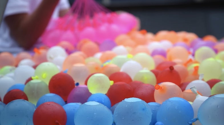 This Is What 1,500 Water Balloons On A Trampoline Looks Like