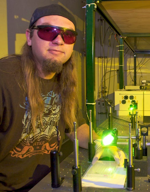 8 September 2009-Santa Barbara, CA: Graduate Student Gary Braun. Researchers at UC Santa Barbara have developed a new way to deliver drugs into cancer cells by exposing them briefly to a non-harmful laser. Photo Credit: Rod Rolle