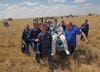 epa03291075 Russian space agency rescue team carry U.S. astronaut Donald Pettit (C)  shortly after the landing of the Russian Soyuz TMA-03M space capsule at the south-east of the Kazakh town of Dzhezkazgan, Kazakhstan, 1 July 2012. The Soyuz capsule, which carried two astronauts and Russian cosmonaut safely returned to Earth on Sunday after a half-year stint on the international space station, with a landing on the Kazakh steppe.  EPA/Mikhail Metzel POOL (Newscom TagID: epaphotos469106.jpg) [Photo via Newscom]