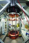 Physicists assemble the LUX (Large Underground Xenon) detector. When in place inside the Homestake mine, the liquid-xenon-filled capsule may detect three or four particles of dark matter a year.
