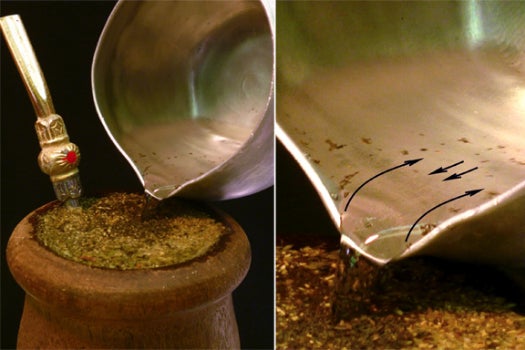 Particles of mate tea travel upstream into a clean pot of water.