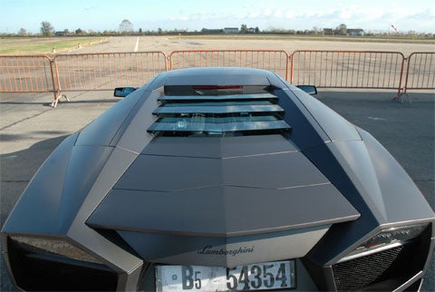 One of the signatures for Lamborghini's modern fleet is a glass laminate engine hood with gaps between each pane for ventilation.