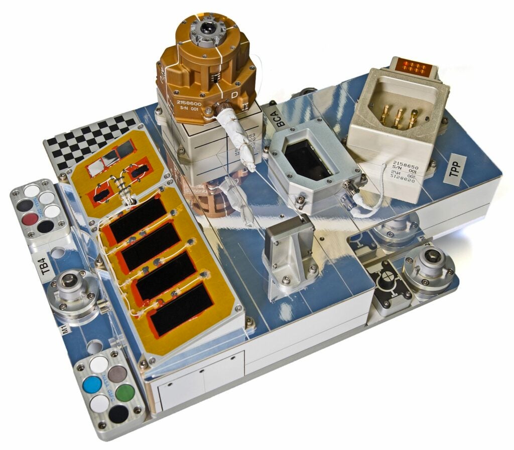 This tray contains a number of devices and materials that NASA is testing in the International Space Station's unpressurized cargo bay. The super-black material appears on the left. ()