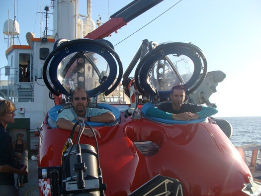 Researcher Sandra Brooke (left) chats with Steve Ross and John Hocevar before a dive. Hocevar has piloted roughly 20 sub dives in his career.