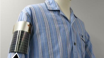 photo of a mannequin wearing a shirt and the prototype electronic armband