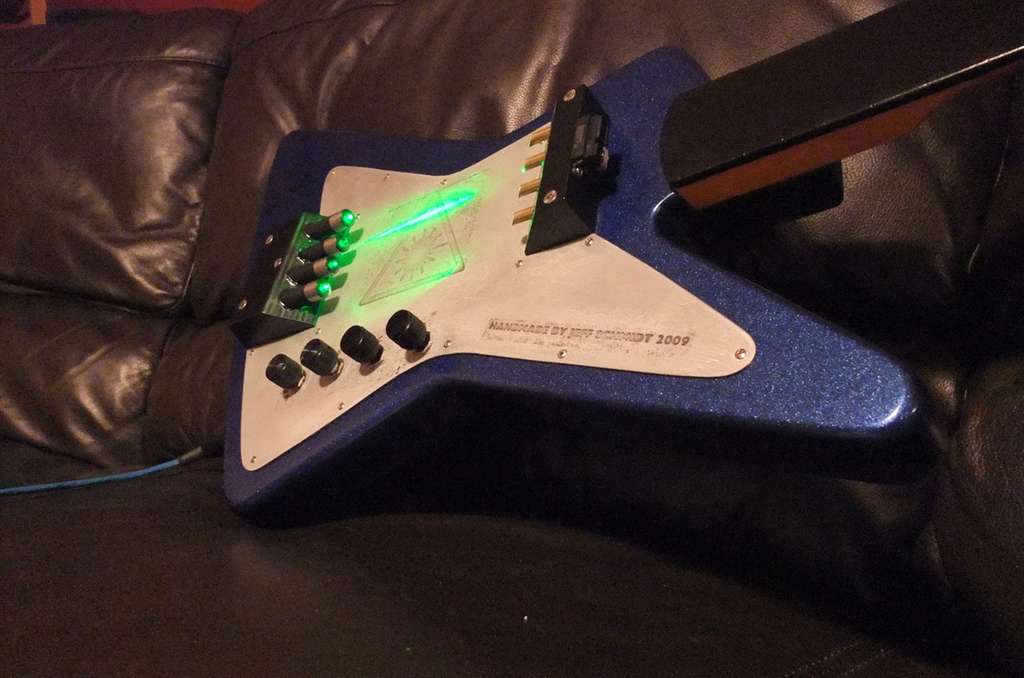 A homemade electric guitar synthesizer with laser "strings."