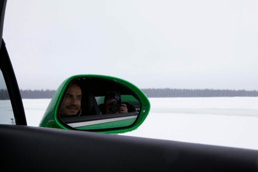Professional driver and instructor Tiago Rodrigues looks out on the ice from the GT Speed.