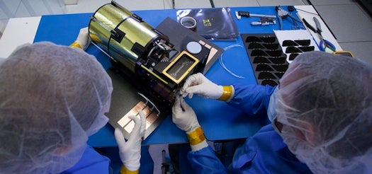 Planetary Resources engineers assemble an ARKYD 100 prototype.
