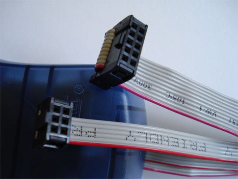 An Atmel AVRISP mkII programmer modified for both six-pin and 10-pin ISP.