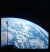 Gemini XI sneaks into this image from 776 miles above the planet.