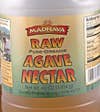 A container of raw agave nectar from the Madhava brand.