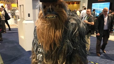 Chewbacca wearing a VR headset at CES 2016
