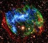 Suzaku detected X-rays produced when heavily ionized iron atoms recapture an electron. This view combines infrared images from the ground (red, green) with X-ray data from NASA's Chandra X-Ray Observatory (blue).