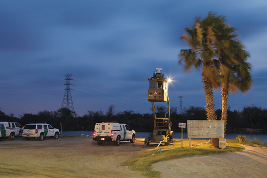 A "sky box" mobile surveillance platform near McAllen, Texas gives agents an excellent perspective, but its mere presence also deters smugglers from crossing the line.