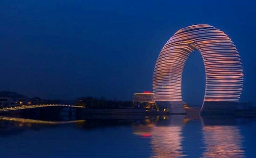 This Mind-Blowing, Horseshoe-Shaped Neon Hotel Can Light Up The Skyline
