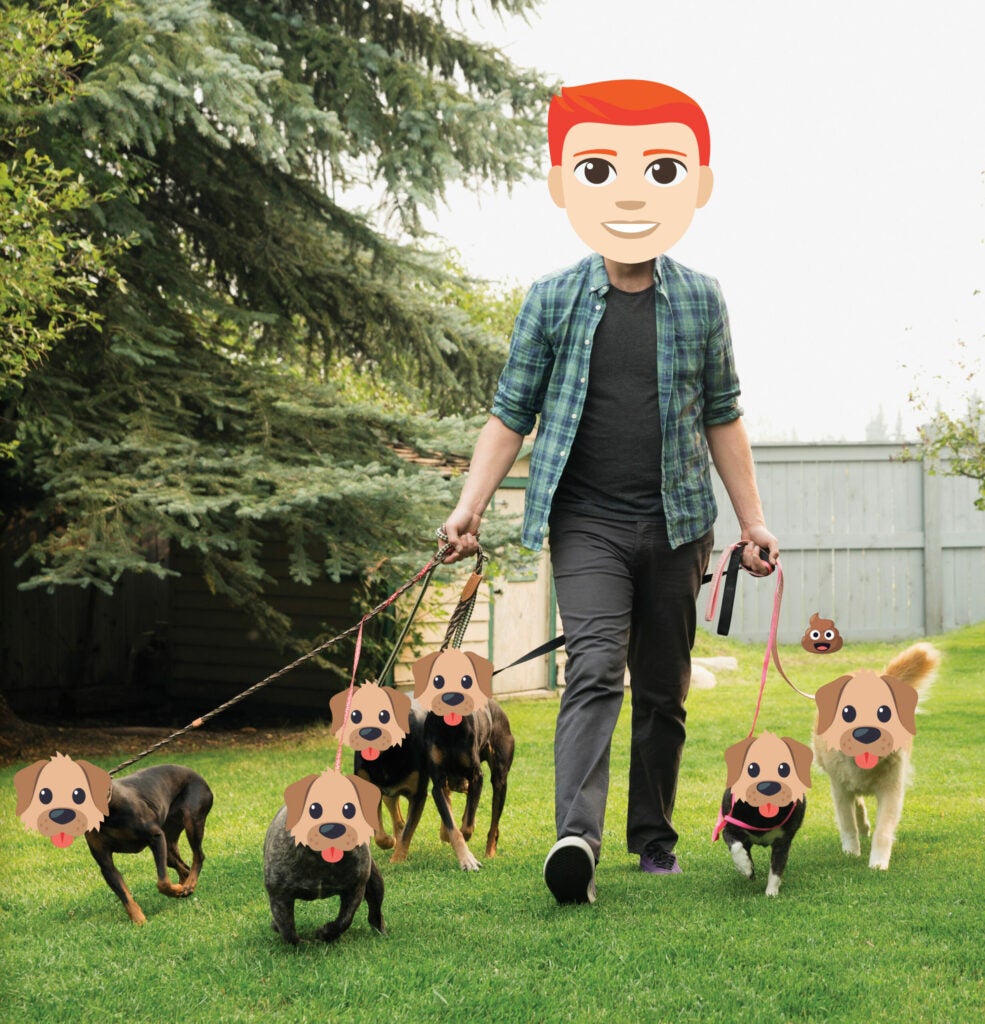 Redheaded emoji walking dogs
