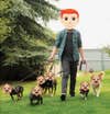 Redheaded emoji walking dogs