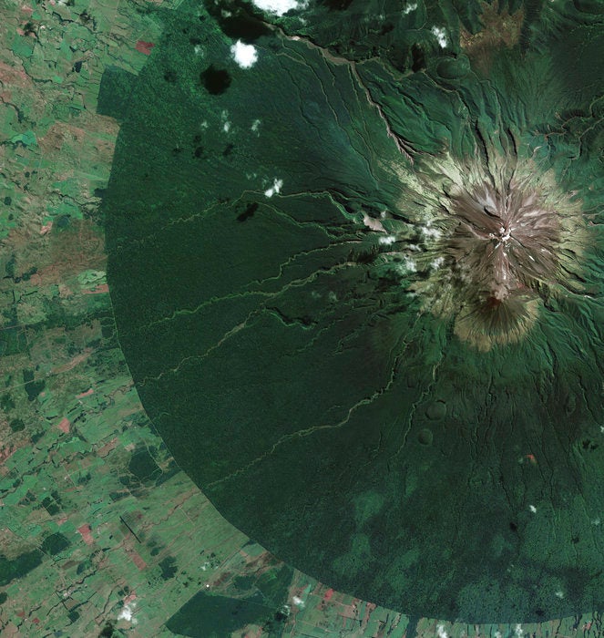From space, New Zealand's Egmont National Park looks like a stunning green circle centered around the volcano Mount Taranaki, which has lain dormant for more than 150 years. The park is home to a tropical rainforest.