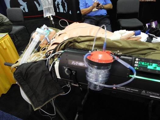 The <a href="http://www.marcorsyscom.usmc.mil/sites/cbrn/FFME_%20MOVES.pdf">Monitoring Oxygen Ventilation and External Suction Device</a> (MOVES) is a life support system that can be mounted to a stretcher and has its own pump and filter that provide the wounded person with the oxygen he needs to survive. It has a monitor to track the patient's health, is powerful enough to work both immediately off the battlefield and in a hospital, and has two batteries, which means one at a time can be swapped out without interrupting the operations of the machine.