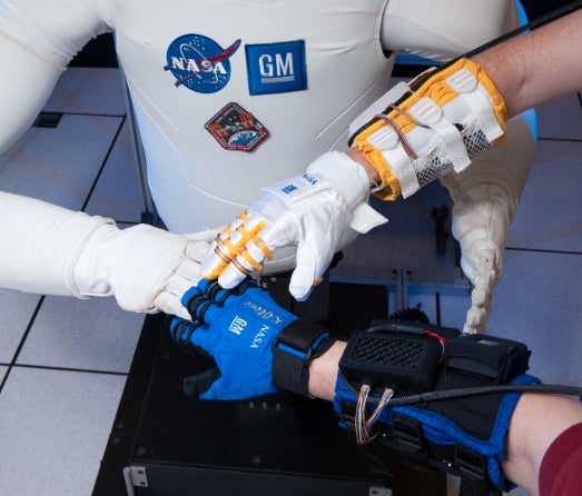 First Humanoid Robot in Space Inspires a Grip-Enhancing Robotic Glove For Humans