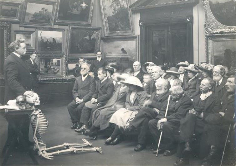 skeleton and crowd in museum