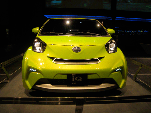 The iQ concept — which Scion classifies as a "micro-subcompact" — is meant to be a city car for the young and the hip. Unfortunately, this tiny clown-faced car probably won't look quite like this if it comes to our shores; the car you see here is a European production iQ, heavily tricked-out by the California design firm Five Axis.