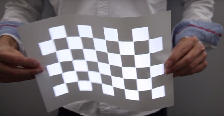 Japanese Projector Displays Smooth Video On A Wriggling, Dancing Surface