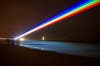 This laser rainbow projection is a project from artist Yvette Mattern. It's a kind of a promotion for the London Olympics; it'll shine along the North Tyneside coastline for four days.