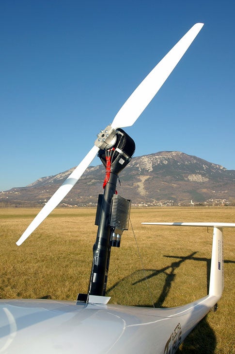 A 35-pound electric motor delivers 30 kilowatts of power to the plane's top-mounted propeller.