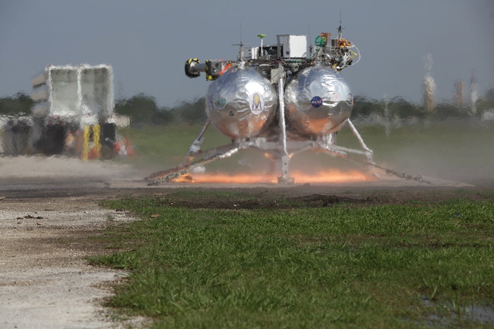 The 12-by-9-foot space lander carries 1,200 pounds of propellant for a 50-second test.
