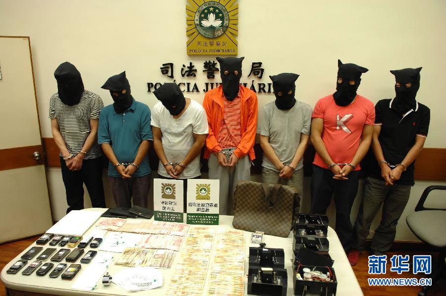 The Macau Police Judiciary busted 7 Chinese nationals in March for cheating unnamed casinos on the island out of the equivalent of $3 million U.S. dollars, by secretly installing mini-cameras and reflective mirrors in automatic card-shufflers at baccarat tables. The camera rig wirelessly beamed video images of card order to a game analyst at an off-site hideout. Determining card order by analyzing the video took 1 to 2 hours, at which time the analyst then sent cheat instructions to accomplices via mobile phone. Casino employees discovered the cameras during routine maintenance in January, with the perpetrators finally arrested in March. Suen Kam-fai of the Macau Judiciary Police told the Hong Kong newspaper The Standard that syndicate members switched the doctored machines into games by using distraction techniques. The Police Judiciary is still investigating whether dealers were complicit in the scam.