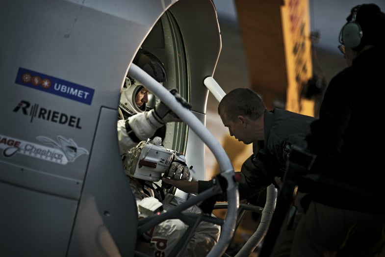 Pilot Felix Baumgartner of Austria sits in his capsule during the preparations for the final manned flight of the Red Bull Stratos mission in Roswell, New Mexico, USA on October 6, 2012.