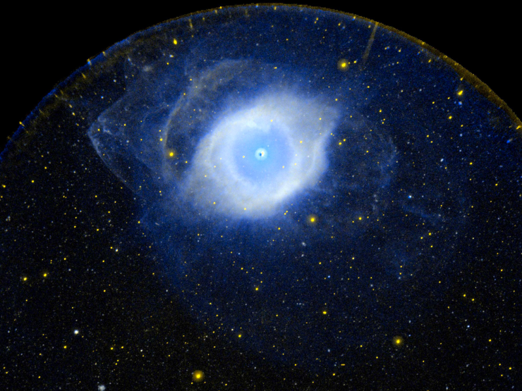 This is the Helix nebula, as seen in ultraviolet light. It is a star like our sun but at the very end of its life.