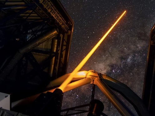This might look like a scene straight out of science fiction, <a href="http://www.eso.org/public/announcements/ann15034/">but it's actually a laser</a> from the European Southern Observatory's Very Large Telescope in Chile. The 22-watt beam is pointed at Saturn, and this is the first of four "laser guide star units." Shining lasers will help astronomers get sharper images of far-off space objects, and this method can help scientists map atmospheric turbulence in greater detail.