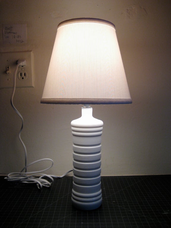 A lamp made out of a mold from a plastic bottle, based on a 1961 article in Popular Science magazine.
