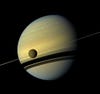 Curiosity has been getting all of the attention lately, but NASA's Cassini probe beamed back this (natural-color) photo of Saturn, with Titan in the foreground. Read more about it <a href="https://www.popsci.com/technology/article/2012-08/cassini-beams-back-stunning-images-seasons-changing-saturn/">here</a>.