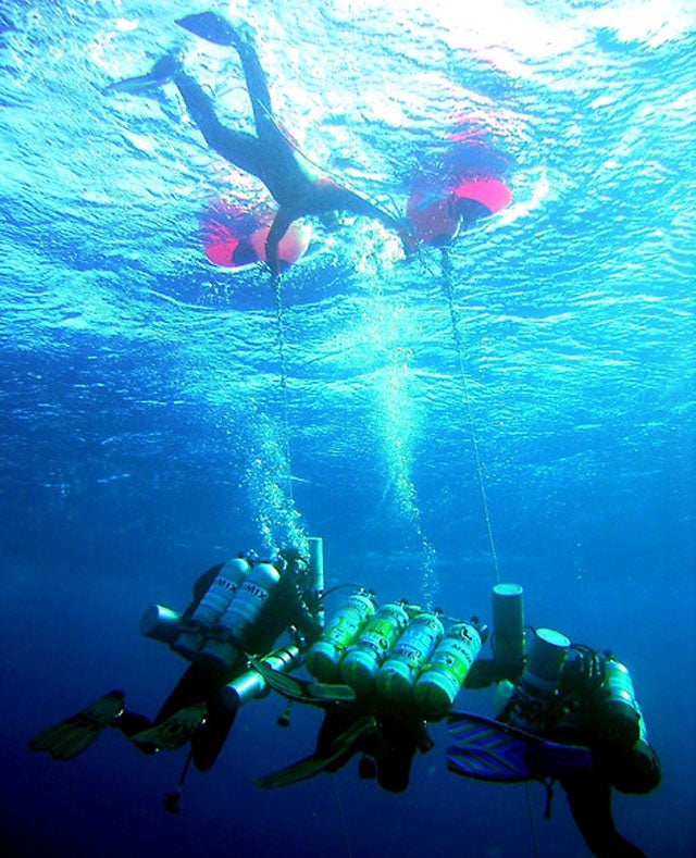 The depth at which South African diver Nuno Gomes set the scuba-dive record in 2005. Gomes was convulsing so badly that the respirator was coming loose from his mouth.