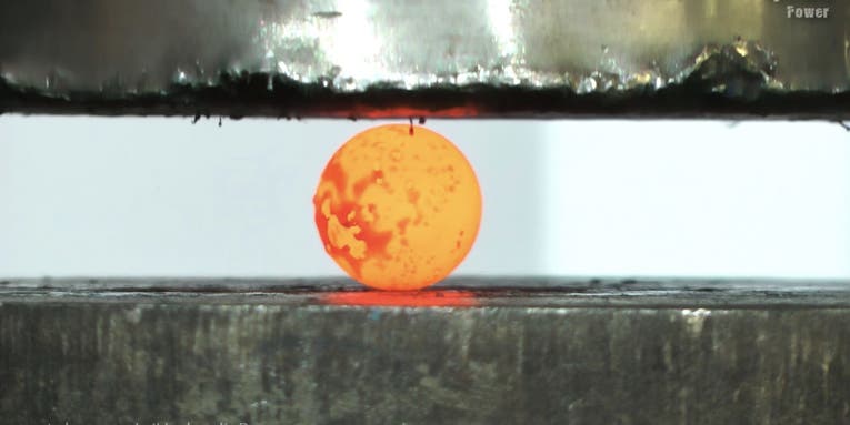 Watch The Red Hot Nickel Ball Get Crushed By A Hydraulic Press