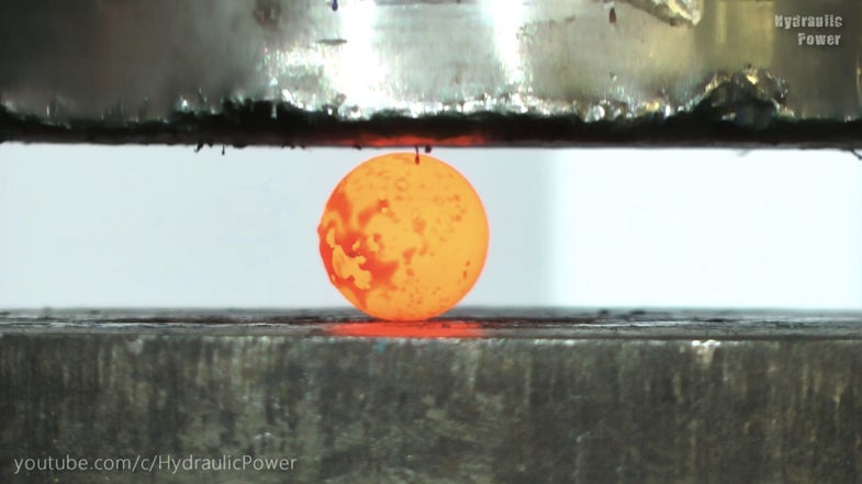 Watch The Red Hot Nickel Ball Get Crushed By A Hydraulic Press