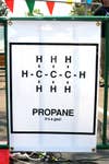 A poster with the chemical formula for propane printed on it, at Maker Faire 2008 in San Francisco.