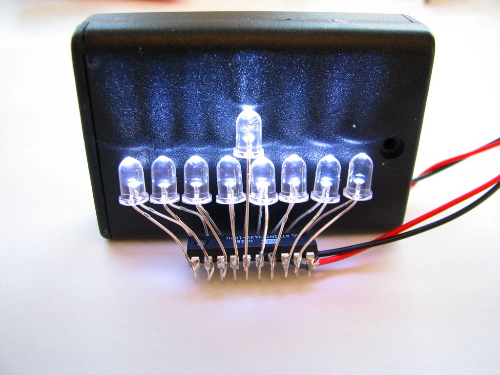 An LED menorah on a computer chip, by Evil Mad Scientist.