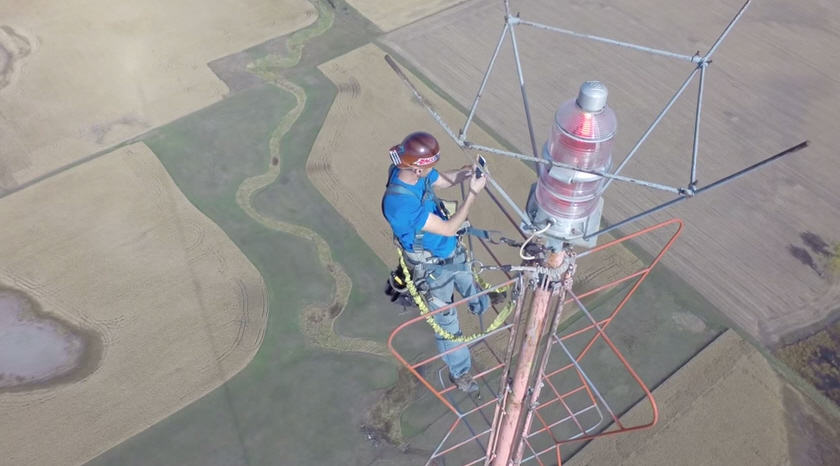 Drone Films Man Changing A Lightbulb 1,500 Feet Above The Ground