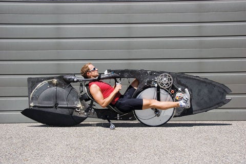 One day. One bullet-shaped bike. One crazy world record In late July, Canadian triathlete Greg Kolodziejzyk pedaled his recumbent bicycle 650 miles around a California track to break the human-powered 24-hour distance record. Equipped with food, water and waste bags, the 70-pound carbon-fiber machine is capable of hitting 60 mph on a flat straightaway. â€Once you get over 12 or 15 mph, 90 percent of your pedaling effort goes to pushing air,â€ Kolodziejzyk says. â€The key to going fast under human power is to minimize the hole you punchâ€ in the atmosphere. To build a bike that did just that, Kolodziejzyk teamed up with fairing designer Ben Eadie, who used flow-dynamics software to test dozens of designs in a virtual wind tunnel. See more details at <a href="http://adventuresofgreg.com">adventuresofgreg.com</a>