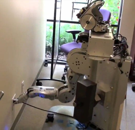 As seen in <a href="https://www.popsci.com/scitech/article/2009-06/new-robot-opens-doors-plugs-self/">New Robot Opens Doors, Plugs Self In</a>