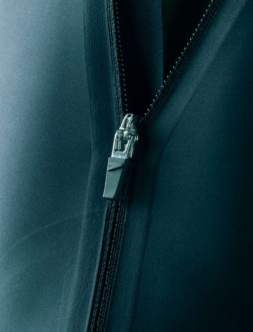 If strands of leg hair can cause drag, imagine what a zipper might do. The suit has ultra low profile zippers for optimized aerodynamics.